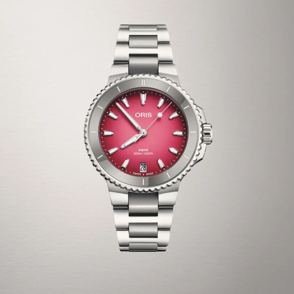 дамски часовник Oris с червено-розов циферблат и сапфирено стъкло