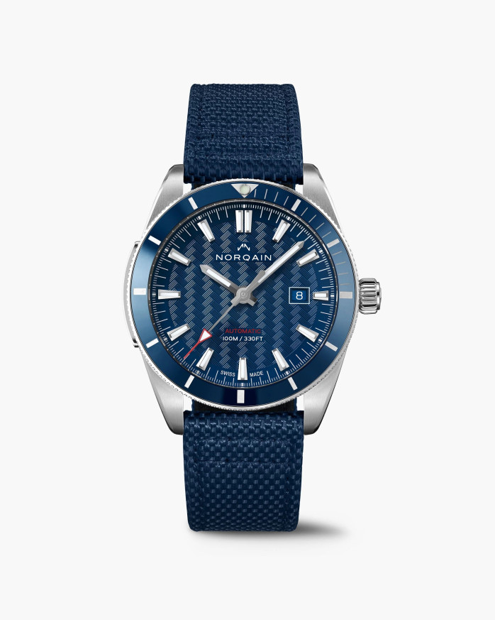 Часовник NORQAIN Adventure Sport 42mm N1000.08S02.A01 със син циферблат и текстилна каишка – classicwatches.bg