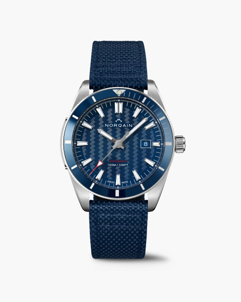 Часовник NORQAIN Adventure Sport 42mm N1000.08S02.A01 със син циферблат и текстилна каишка – classicwatches.bg