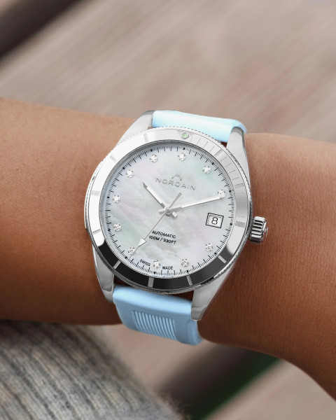 NORQAIN Adventure Sport N1800.08S14.W01 дамски автоматичен часовник със светлосиня гумена каишка – classicwatches.bg